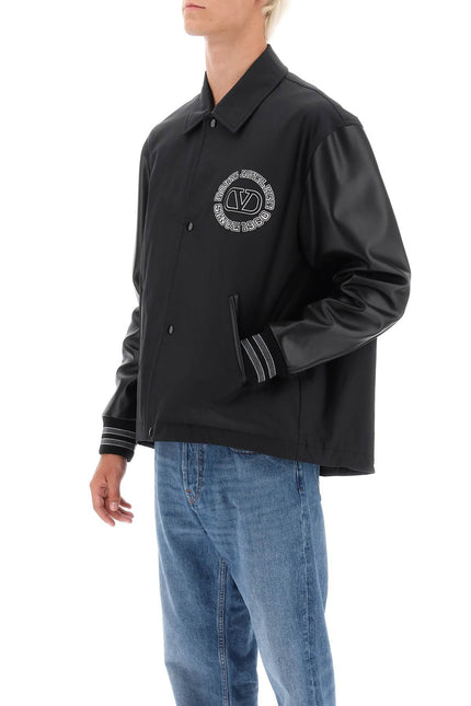 Varsity Jacket With Leather Sleeves